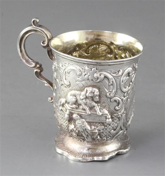 A Victorian embossed silver christening mug, James Charles Edington, 5 oz.